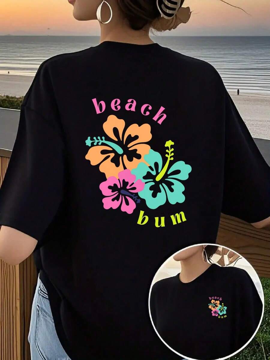 Women's Beach-Style T-Shirt With A Hawaiian Floral Print, Featuring A Round Neck, Short Sleeves, And A Fun, Casual Design. It's Perfect For Everyday Wear And Is Suitable For All Seasons. This Stylish T-Shirt Can Also Be Worn As An Elegant Party Outfit, A Stylish Blouse For Curvy Women, Or Paired With Prom Skirts. - 黑色 - 查看 1