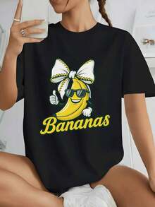 Women's 100% Cotton T-Shirt With A Fun Banana Character Wearing Sunglasses And A Big Bow Making A "Thumbs Up" Symbolizing Positivity And Good Vibes - 黑色 - 查看 1