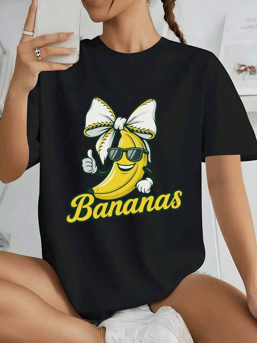 Women's 100% Cotton T-Shirt With A Fun Banana Character Wearing Sunglasses And A Big Bow Making A "Thumbs Up" Symbolizing Positivity And Good Vibes - 黑色 - 查看 1