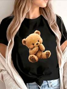 Women's Plus Size Essential One-Piece Casual T-Shirt, With Fashionable Print For All Seasons, Cute Teddy Bear Print T-Shirt - Featuring A Teddy Bear Face Design And Heart-Shaped Hand, Round Neck, Short Sleeve, Casual Top, Comfortable For Everyday Wear, Made Of Soft Cotton For Daily Use. - 黑色 - 查看 12