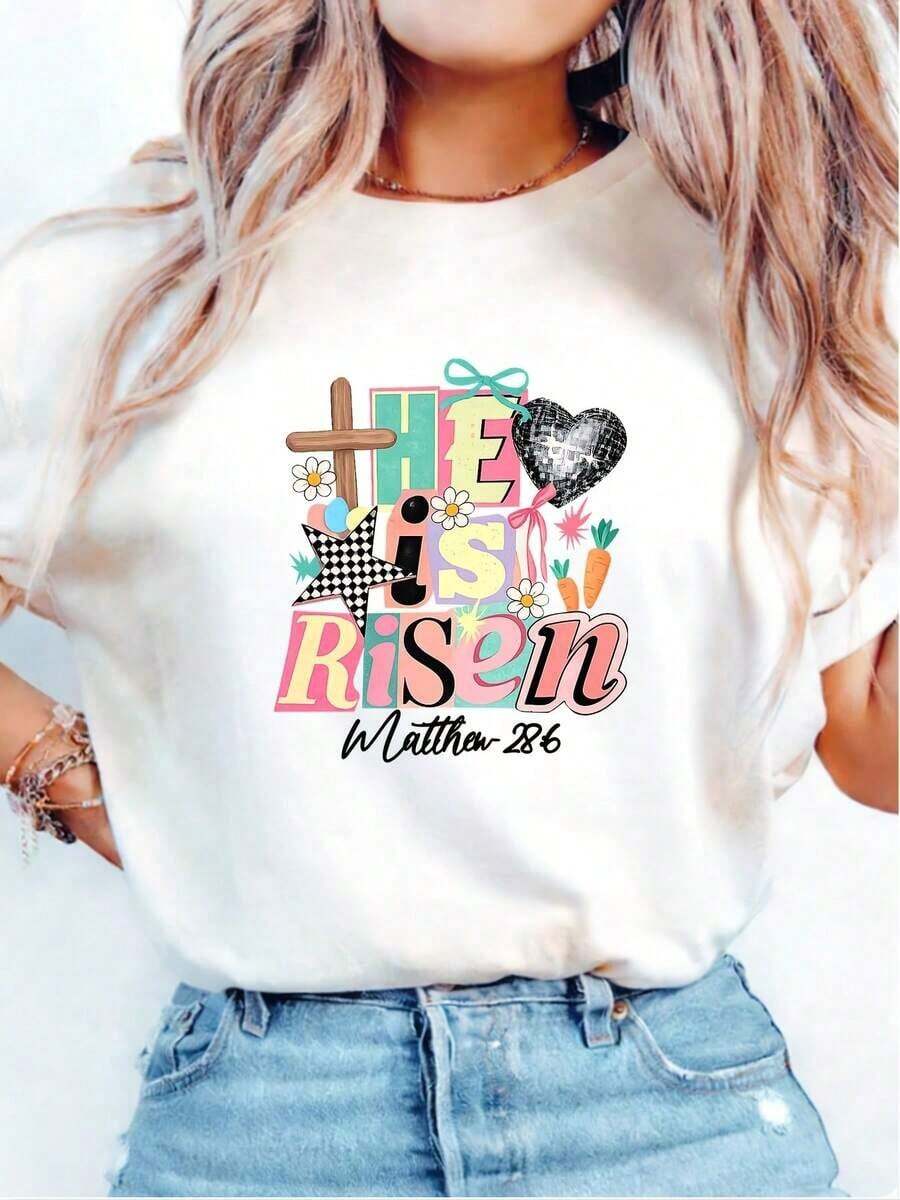 Women's White Short-Sleeved T-Shirt With Round Neck, Displaying A Floral Cross And The Phrase 'THE IS RISEN', Perfect For A Casual Spring/Summer Look In 2026. - White - View 1