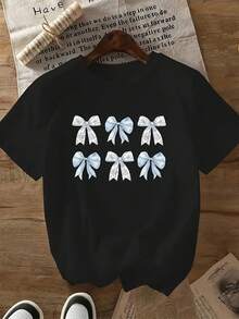 Camiseta estampada para mujer - Camiseta casual negra de manga corta y cuello redondo con bonitos lazos estampados, corte holgado para todas las estaciones, perfecta para uso diario y conjuntos de vacaciones (lavable aáquina). - Negro - Ver 6