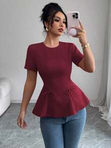 Blusa casual de primavera y verano, elegante, de estilo francés, de unicolor, con cuello redondo, corte evasé, manga corta, con cintura ceñida, detalle de lazo y cremallera posterior - Granada - Ver 1
