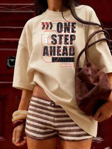 T-Shirt With "One Step Ahead" Text And Urban Graphic Design.  Short-Sleeved T-Shirt For Spring And Summer 2026, Made In Mexico, 180 Grams. Cartoon Print, Couple Design, Suitable For Indoor Or Outdoor Wear. Crew Neck, Unisex, Ideal For The Office And Leisure. One-Pack. - APR-P631577SLNDXZGY618 - 查看 3