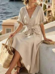Holidaya Vestido midi con cuello en V y cintura anudada - Ideal para uso casual, playa, vacaciones y uso diario, vestido azul bohemio con bajo asimétrico |   Vestido esencial de verano para vacaciones de mujer, vestido envolvente ligero, elegante y casual |   Vestido de manga corta con cuello en V, perfecto para viajes y fiestas - Albaricoque - Ver 6