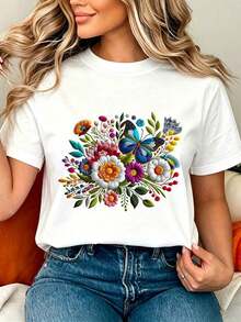 short sleevesCamiseta de mujer de manga corta en color blanco, con estampado de flores silvestres multicolor agrupadas que rodean mariposas en tonos azul y violeta, combinando colores rojo, naranja, azul y morado en contraste vibrante, creando un estilo bohemio y retro, ideal para un look casual y versátil. Ocio - Blanco - Ver 1