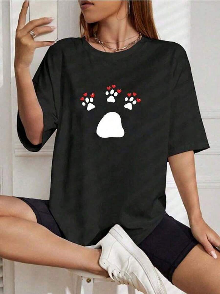 Camiseta negra informal de manga corta con cuello redondo para hombre,Camisetas Para Mujer Camiseta única con diseño de huellas de patas y corazones perfecta para amantes de los animales y la moda y2k ideal para cualquier ocasión. Destaca tu estilo y tu amor por las mascotas con esta T-shirt de alta calidad. - Negro - Ver 1
