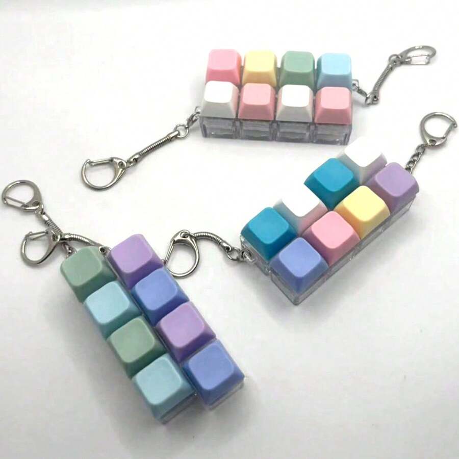 1 pieza Llavero antiestrés estilo teclado 4 en 1 con clip portátil, colgante lindo y curativo para llaves/bolso