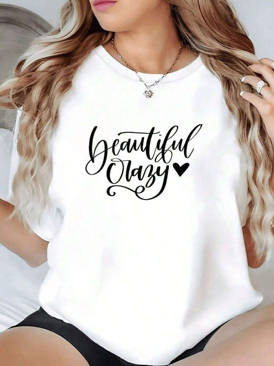100% Cotton. The Print Expresses Self-Love And A Cheerful Attitude With The Phrase "Beautiful Crazy" Accompanied By A Heart That Symbolizes Freedom And Inner Confidence. Soft, White, 100% Cotton, Comfortable And Modern Women's T-Shirt. Women's Simple Solid Color T-Shirt, Loose And Slim Fit Casual Short Sleeve - 白色的 - 查看 1
