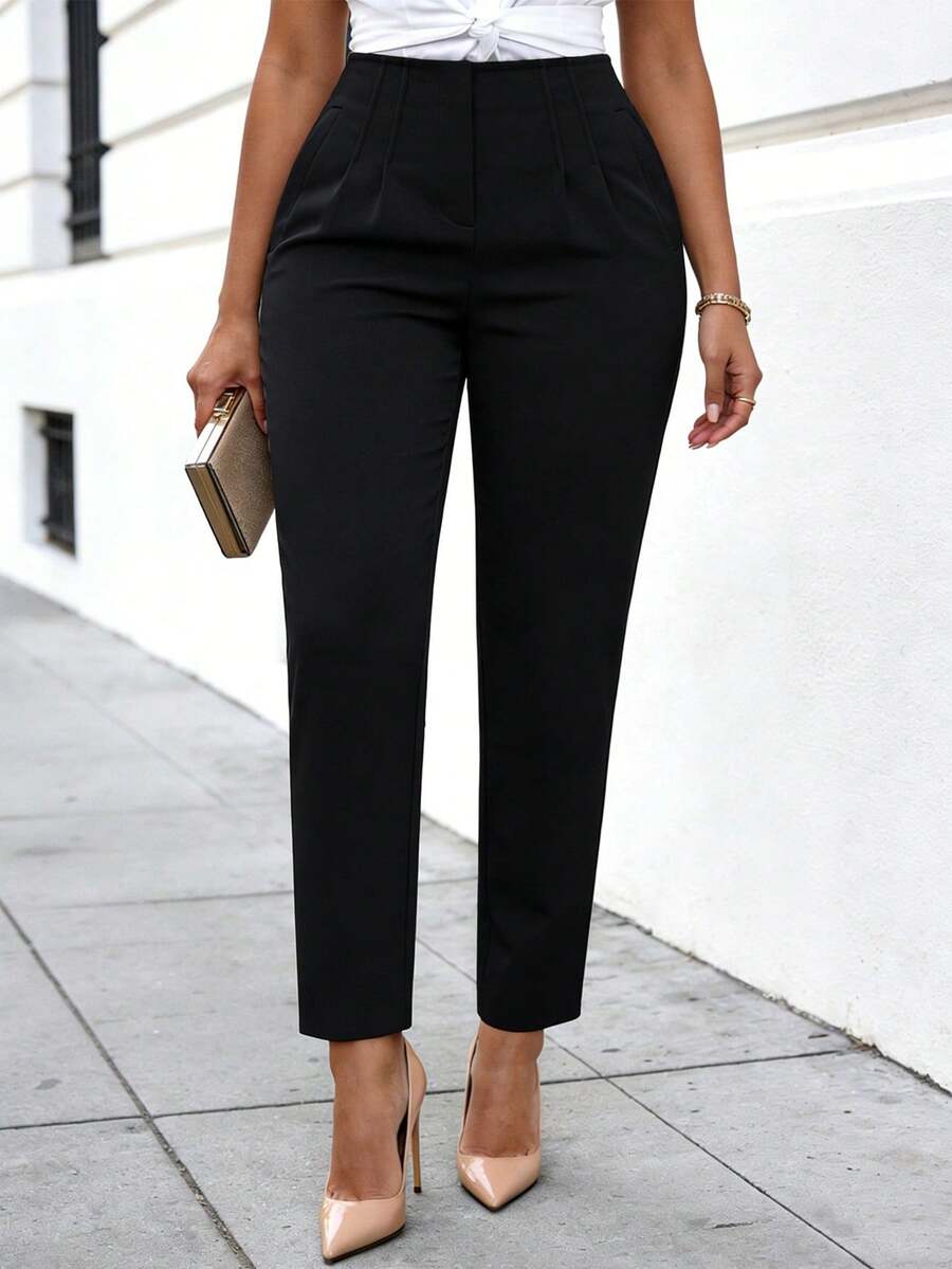 Pantalones de trabajo ajustados y acortados de color liso que ceñen la cintura