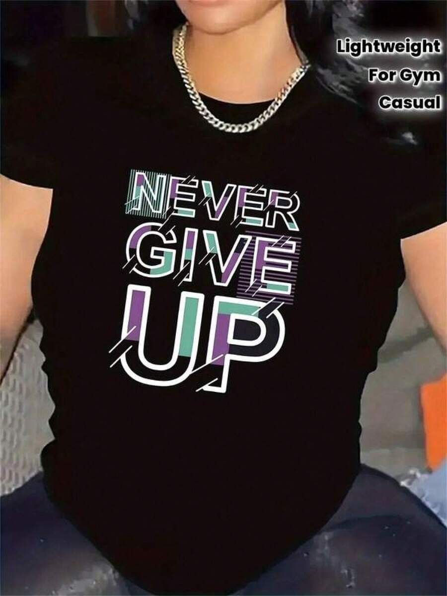 Camiseta negra informal de manga corta con cuello redondo para hombre,Camisetas Para Mujer Camiseta exclusiva y2k Never Give Up, diseño vibrante y motivador ideal para el gimnasio o uso diario, perfecta para quienes buscan un estilo único y atrevido, atrévete a lucirla y expresa tu pasión por la moda contemporánea, solo una pieza disponible - Negro - Ver 1