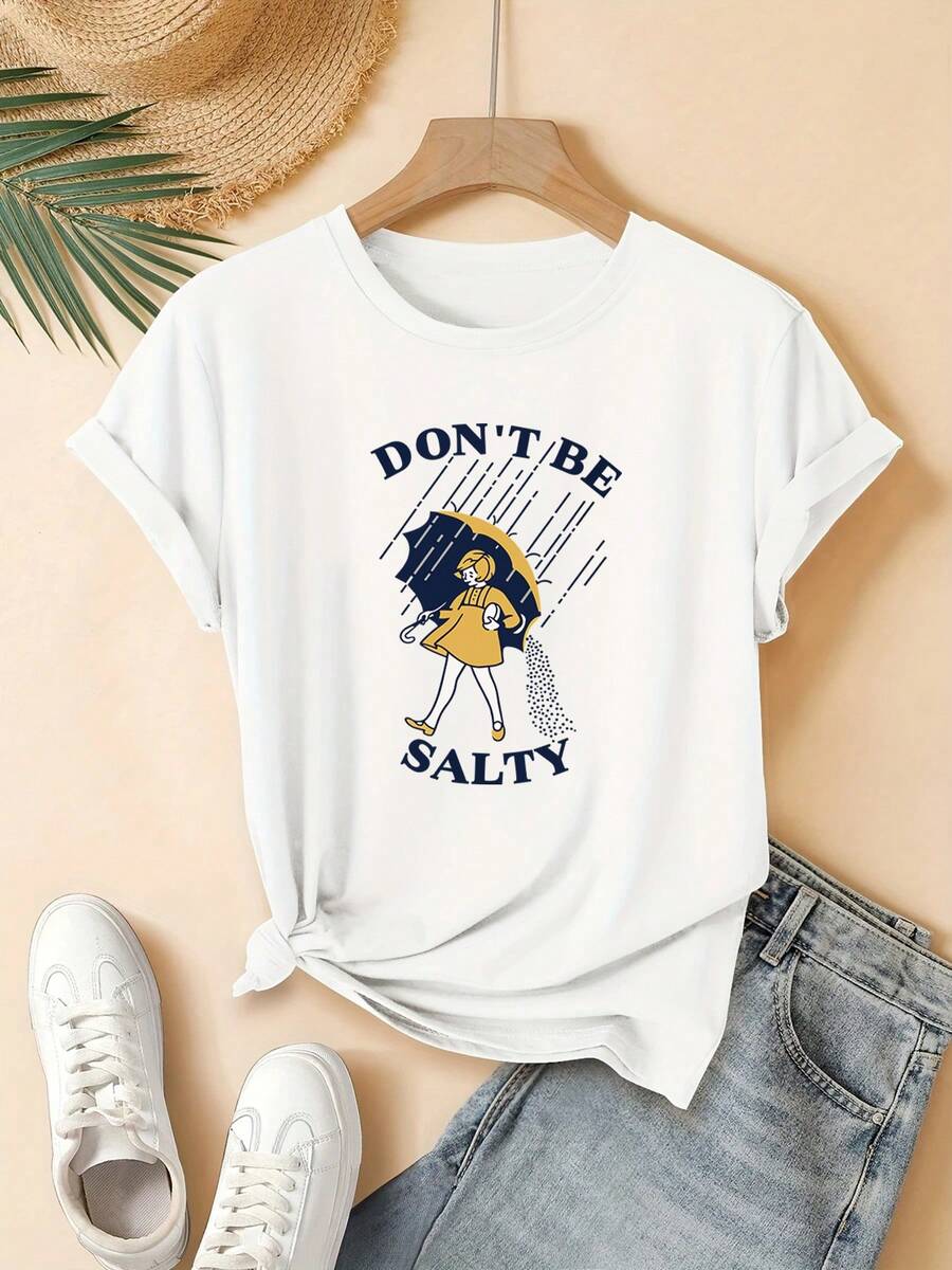 A Modern, Minimalist T-Shirt For Young Women Featuring A "DON'T BE SALTY" Print Depicting A Girl Holding An Umbrella In The Rain. It's A Casual, Urban-Style Garment Perfect For Everyday Wear, A Great Gift Option, And Suitable For Home, Office, And Other Informal Occasions. - 白色 - 查看 1