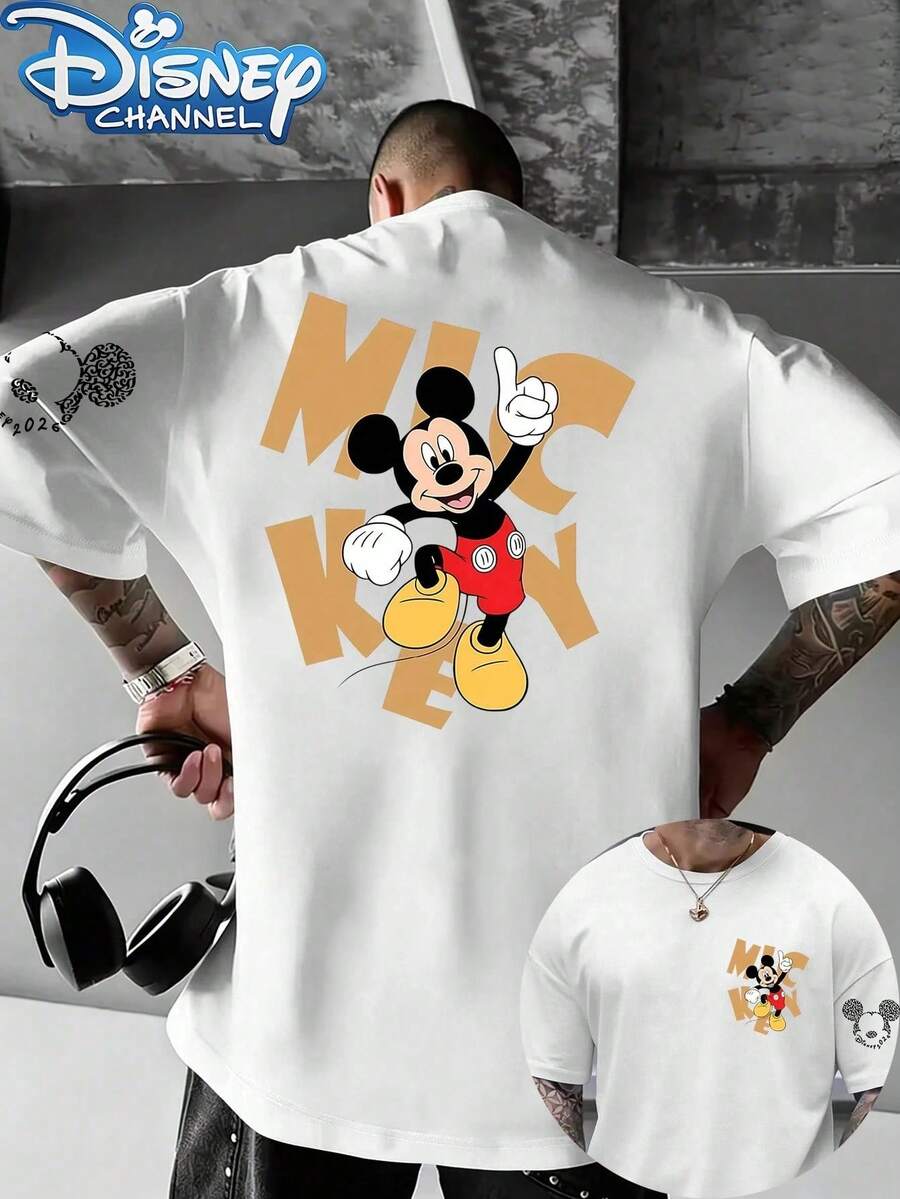 Disney Men's Classic "Mickey Mouse" Graphic T-Shirt, Featuring The Iconic "Big Cheese" Character In A Cheerful, Point-Up Gesture Design, Crew Neck, Short Sleeve, Made From Premium 100% Cotton. This Striking White T-Shirt Displays A Vibrant Full-Color Print Of Mickey On The Back, Played Against Large Gold "MICKEY" Lettering, Paired With A Mini Matching Print On The Chest And A Textured Silhouette Design On The Sleeve. The Bold, Warm Graphic And Uplifting Pose Capture The Timeless Optimism And Joyful Spirit Of The World's Most Famous Mouse, Blending Retro Charm With A Fresh, Street-Ready Vibe. Perfect For Everyday Wear, Casual Outings, Or Themed Events, It's Made From Soft, Breathable Cotton For All-Day Comfort, Pairs Easily With Jeans, Cargo Pants, Or Shorts, And Appeals To Fans Of All Ages. - trắng - Xem 1