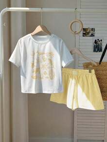 Conjunto casual de 2 piezas de mujer con camiseta de manga corta con cuello redondo y estampado de estrellas de mar, y shorts a rayas en azul marino - Amarillo - Ver 1