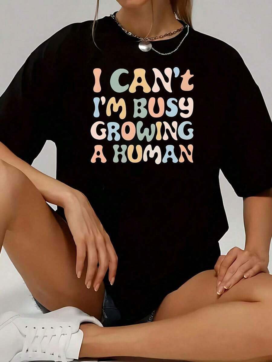Cool Casual T-Shirt With The Phrase "I Can't, I'm Busy Creating A Human Being" - A Humorous Pregnancy Announcement Gift For Expectant Mothers. 1 Piece Of Women's Funny Oversized Graphic Print Short-Sleeve Novelty T-Shirt, 100% Polyester, Crew Neck, Casual Style. - 黑色 - 查看 1