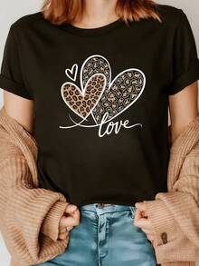 Dos corazones con estampado animal simbolizan pasión y libertad acompañados de una palabra que expresa ternura camiseta de mujer - Negro - Ver 8