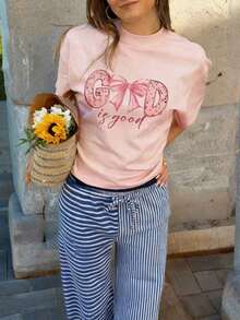 Short-Sleeved T-Shirt With A Round Neck And Sheep Slogan Print, New For Summer, Simple Style. Apricot Color. Versatile Fashion, Suitable For Everyday Wear. Casual Blouse For Women In Pink. - Baby Pink - View 10