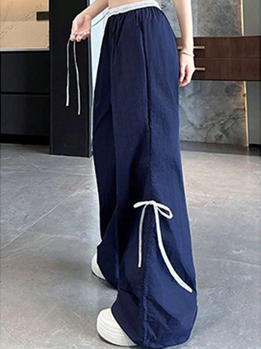 Women's Wide-Leg Trousers With Adjustable Drawstring, Loose Fit And Inspired By Urban Fashion, With Belt Loops And Pockets, Made Of Polyester Fabric With Bow Detail. - Navy Blue - View 1