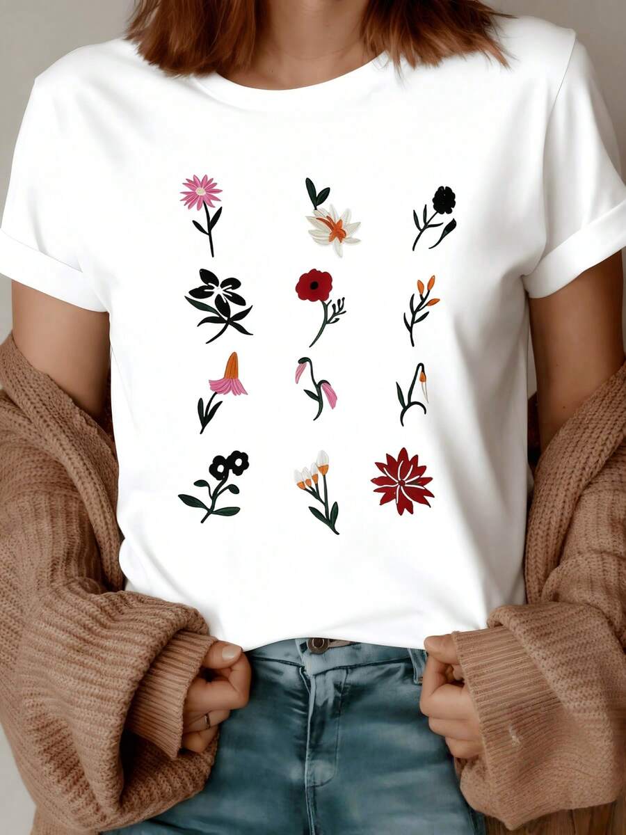 Embroidered Flowers Symbolize Growth, Hope, And Inner Beauty In Soft Colors That Evoke Calm And A Connection With Nature. A Modern, Casual, Short-Sleeved Women's T-Shirt, Comfortable For Everyday Wear. - 白色 - 查看 1