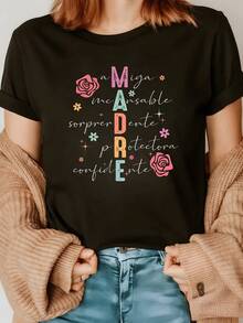 Roses And Colorful Letters Spell Out The Word MOTHER, Representing Love, Strength, Protection, Friendship, And Trust. A Perfect Gift For Mom. Casual, Comfortable, And Stylish Women's T-Shirt. - Black - View 1