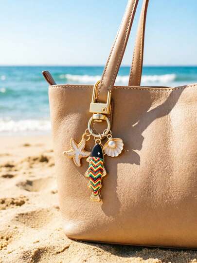 Portachiavi con atmosfera da spiaggia, con charm in smalto a forma di pesce, stella marina e conchiglia - Charm da appendere a borse e zaini, in tonalità oro, charm da spiaggia estiva con pendente a forma di conchiglia con perla, per vacanze al mare, per famiglia, amici e persone care; regali di compleanno, anniversario, inizio scuola, regali per insegnanti