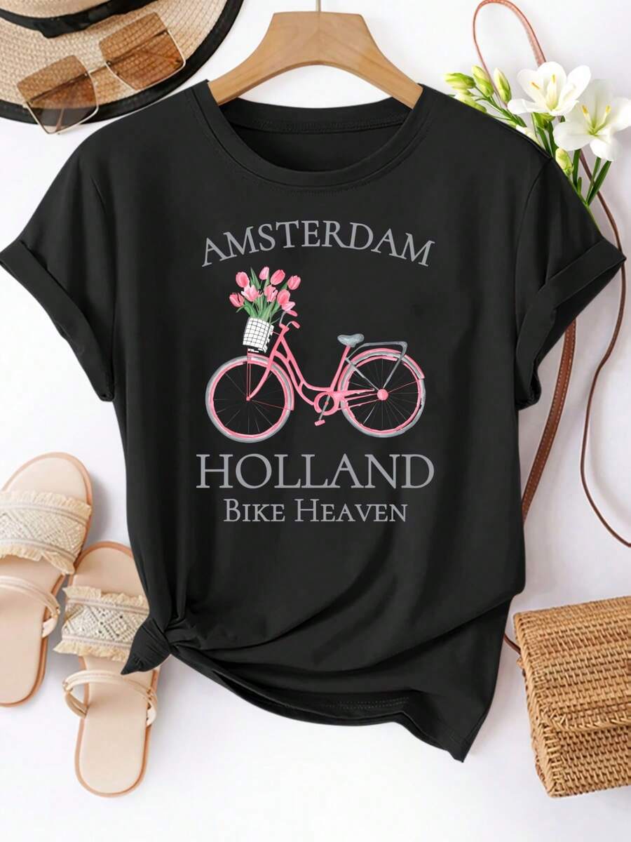Una camiseta de mujer de manga corta, holgada, moderna, retro y elegante, adecuada para actividades al aire libre en primavera y verano.Camiseta casual de manga corta para mujer - Ámsterdam, Países Bajos, con estampado de tulipanes y bicicletas.Hecha de tela suave y elástica, lavable a máquina para comodidad en todas las estaciones, perfecta para el uso diario.blusas para mujer,blusas casuales para dama,tops,, mujer premium,y2k,playeras de mujer curvy,ofertas y liquidaciones ropa mujer,playeras deportivas para mujer,,playeras de hombre, mujer,blusas>elegante JMYE - Negro - Ver 1