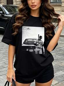 Camiseta de manga corta con cuello redondo suave y casual para mujer, el estampado gráfico de jugador de béisbol es ideal para conjuntos de primavera y verano. Negro. - Negro - Ver 1