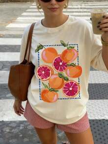 Nueva camiseta de verano casual con estampado naranja de cuello redondo y manga corta, top de mujer de moda y versátil - Albaricoque claro - Ver 9