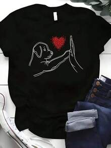 1 Pieza Playera Casual Unisex Estilo TendenciaCamiseta única y moderna con diseño Y2K de un perro mostrando amor con una mano y un corazón brillante, perfecta para amantes de los animales y la moda contemporánea, ideal para resaltar tu estilo en cualquier ocasión. - Negro - Ver 1