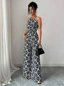 Mono de tela estampada con envolvente frontal para mujer, diseño que define la cintura para usar en ocasiones elegantes, ya sea de fiesta o diario - Blanco y Negro - Ver 4