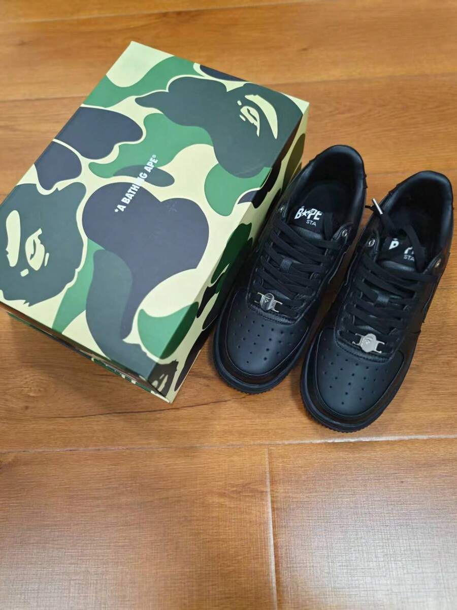 A BATHING APE Bape Casual Contrast Color Star Glossy Sneakers - All Black - View 1