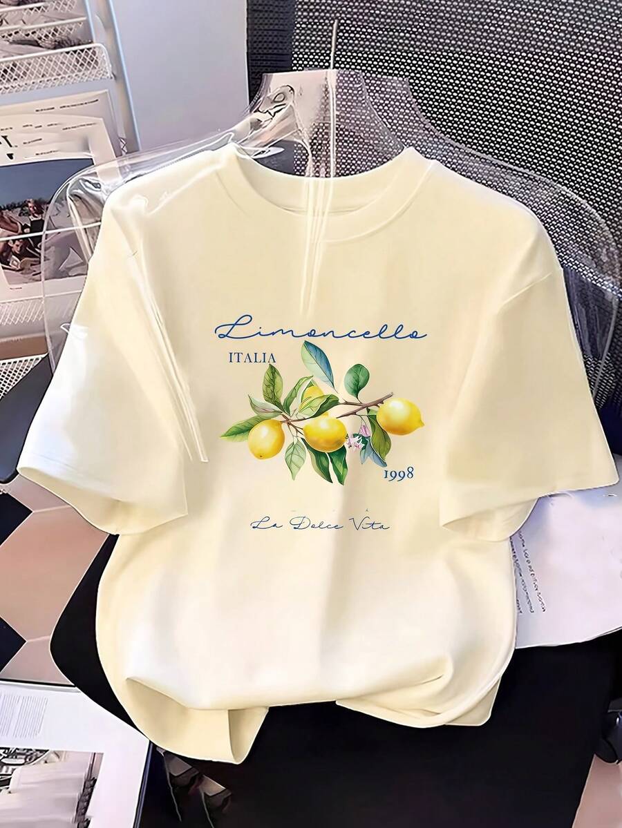 Camiseta inspiradora para mujer con estampado de ramas de limón italiano - Cuello redondo - Diseño ligero de fantasía casual para primavera/verano y cita distintiva - Lavable a máquina, ropa casual cómoda y ropa de invierno para mujer - Albaricoque - Ver 1