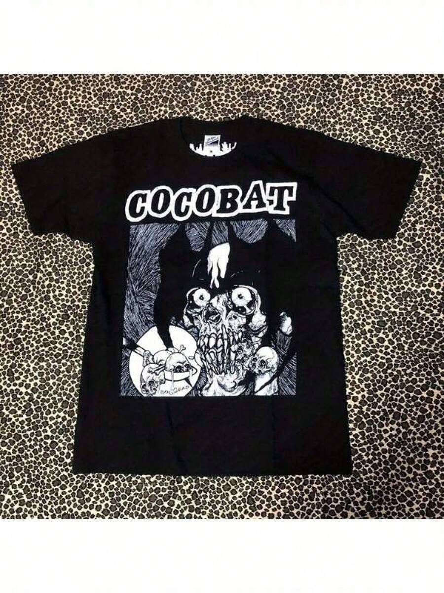 2026 new Camisetas Para Mujer Camiseta única con diseño atrevido de Cocobat y gráficos impactantes inspirados en el arte oscuro y lo sobrenatural perfecta para los amantes de la moda  y para quienes buscan un estilo y2k original y llamativo ideal para cualquier ocasión - Negro - Ver 1