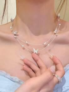 CVNANA 1 chiếc vòng cổ ngọc trai hình bướm hai lớp thanh lịch, tinh tế dành cho nữ, phong cách nghỉ dưỡng biển, vòng cổ choker tối giản ngọt ngào, unisex, món quà hoàn hảo cho sinh nhật, kỷ niệm, ngày Valentine, tiệc tùng, hoặc đeo hàng ngày. - A - Xem 5