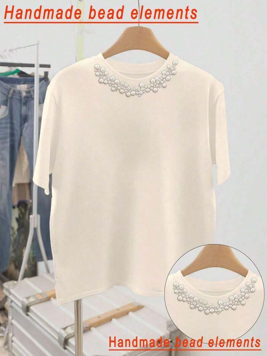 mujer de talla grande con estampado de bordado vintage de gato y floral, de cuello redondo y manga corta, top floral azul, adecuado para uso diario y vacaciones de verano - Albaricoque - Ver 1