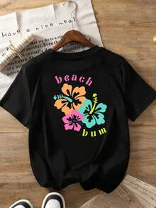 Women's Beach-Style T-Shirt With A Hawaiian Floral Print, Featuring A Round Neck, Short Sleeves, And A Fun, Casual Design. It's Perfect For Everyday Wear And Is Suitable For All Seasons. This Stylish T-Shirt Can Also Be Worn As An Elegant Party Outfit, A Stylish Blouse For Curvy Women, Or Paired With Prom Skirts. - 黑色 - 查看 2
