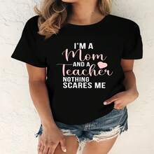 Camiseta casual de algodón para mujer con estampado de "Maestra Mamá", manga corta, cuello redondo y corte regular. - Negro - Ver 1