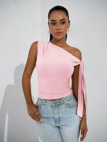Blusa elegante de mujer con cuello asimétrico y hombro oblicuo con lazo, adecuada para uso diario, citas, salidas, discoteca, fiestas y reuniones - Rosa coral - Ver 6