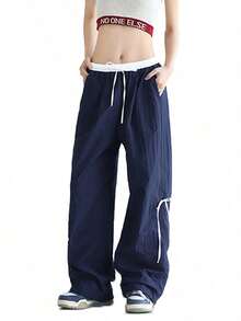 Women's Wide-Leg Trousers With Adjustable Drawstring, Loose Fit And Inspired By Urban Fashion, With Belt Loops And Pockets, Made Of Polyester Fabric With Bow Detail. - Navy Blue - View 2