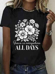 Women's Summer T-Shirt With White Floral Print "Elegance Is Everywhere, Every Day". This Fashionable Women's Top Is Made Of Pure Cotton, Features A Round Neck, Short Sleeves, And Is Casual, Breathable, And Soft. A Must-Have For Everyday Wear, It Makes The Perfect Gift For Her. This Printed, Simple, Versatile, Loose-Fitting Top Has A Round Neck. - 黑色 - 查看 8