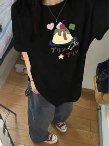 Camiseta Estampada para Mujer - Camiseta Casual Negra de Manga Corta y Cuello Redondo con Lindos Lazos Estampados, Corte Relajado para Todas las Estaciones, Perfecta para el Uso Diario y Atuendos de Vacaciones (Lavable aáquina). - Negro - Ver 1