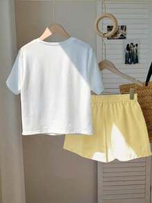 Conjunto casual de 2 piezas de mujer con camiseta de manga corta con cuello redondo y estampado de estrellas de mar, y shorts a rayas en azul marino - Amarillo - Ver 2