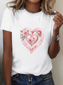 Ropa de mujer, camiseta holgada para damas - Blusa blanca suave, transpirable, cómoda y de buen ajuste, con estampados de corazones femeninos y motivos florales, decorada con rosas rosadas y hojas verdes - Una prenda casual imprescindible para la primavera y el verano, la camiseta tiene un diseño duradero de cuello redondo, creando una prenda de moda ligera y cómoda para mujeres. - Blanco - Ver 2