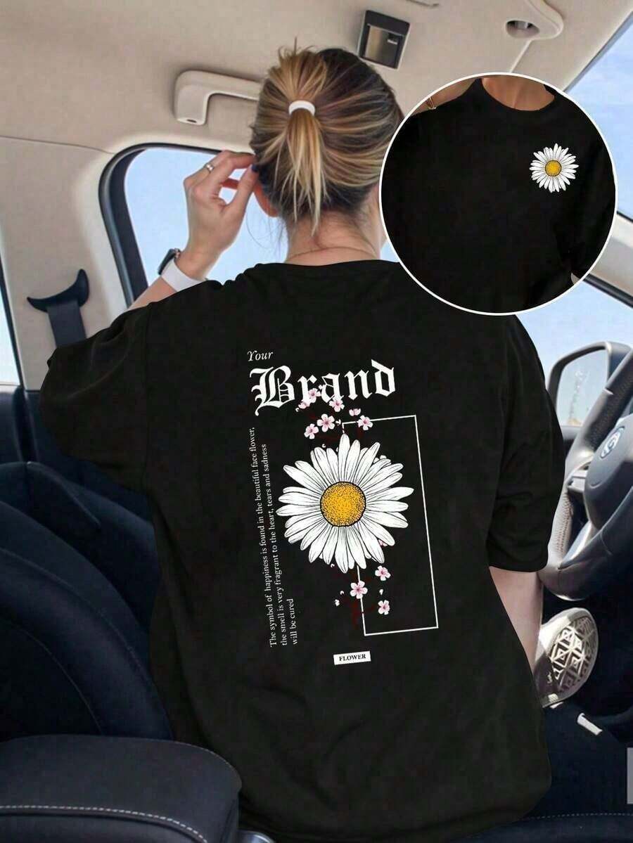 Under The RadarCamiseta de manga corta para mujer con estampado floral de margaritas blancas estilo gótico en la parte delantera y trasera, holgada, casual, transpirable, de cuello redondo, versátil para el uso diario, adecuada para salidas urbanas, estilo callejero mexicano. Camiseta unisex de algodón holgada de manga corta y cuello redondo estilo vintage urbano - Negro - Ver 1