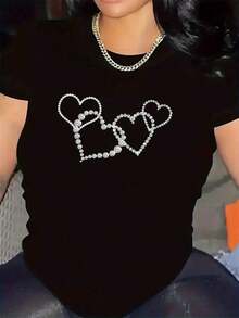 Soft, Breathable, And Lightweight For All-Day Comfort. This Polyester T-Shirt Features A Rhinestone Heart Design, Making It Perfect For Restaurants. The Lightweight Yet Durable Fabric Offers A Comfortable Fit, Ideal For Casual Dining And Lounging At Home. It's Stylish And A Great Addition To Women's Everyday Outfits. The Classic Crew Neck And Relaxed Fit Flatter All Body Types And Are Easy To Pair With Jeans, Shorts, And Leggings. - 黑色 - 查看 3