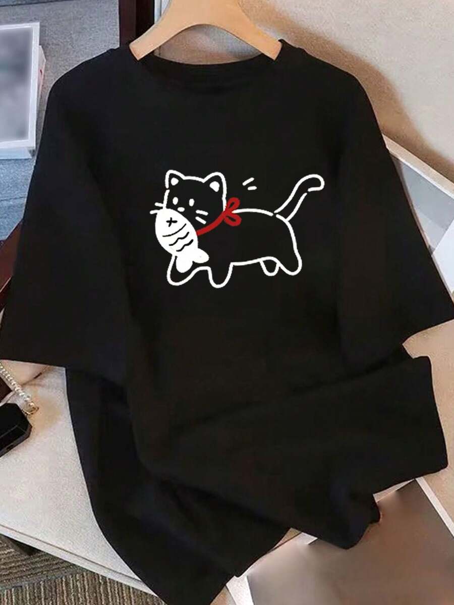 Camiseta blanca casual para mujer, de corte holgado, con un diseño de un gato selfie de dibujos animados. Esta camiseta de manga corta y cuello redondo es lavable a máquina, elegante y adecuada para el uso diario, hecha de un tejido suave y duradero. - Negro - Ver 1