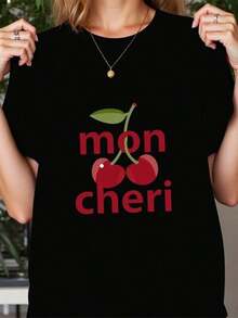 2026 new Camisetas Para Mujer Camiseta estampada de cerezas mon cheri para mujeres modernas y casuales, ideal para salidas con amigos o días relajados, disponible en negro, modelo suelto y cómodo, moda femenina,  de verano. - Negro - Ver 1
