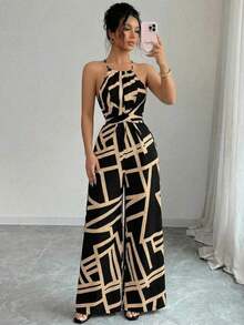 Mono de tela estampada con envolvente frontal para mujer, diseño que define la cintura para usar en ocasiones elegantes, ya sea de fiesta o diario - Negro - Ver 3