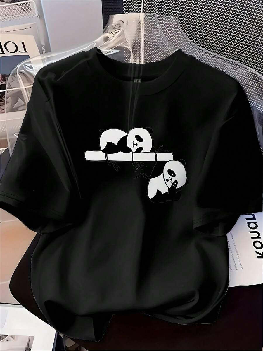 Top estampado de moda para mujer, suave y versátil, con un lindo diseño de panda, cómodo y suave, camiseta de manga corta con cuello redondo estampado, adecuada para uso casual, una prenda elegante para todas las estaciones. - Negro - Ver 1