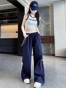 Women's Wide-Leg Trousers With Adjustable Drawstring, Loose Fit And Inspired By Urban Fashion, With Belt Loops And Pockets, Made Of Polyester Fabric With Bow Detail. - Navy Blue - View 5